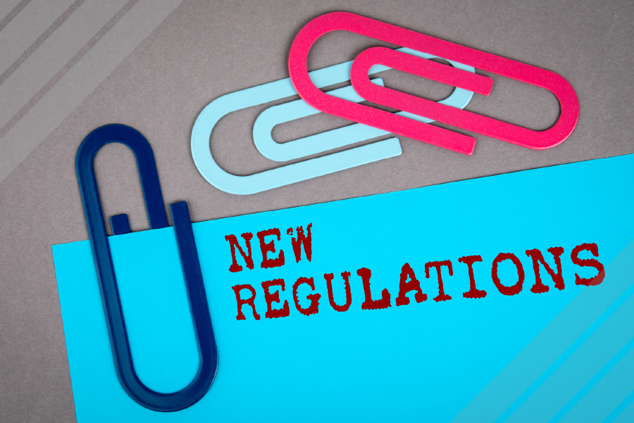 regulations sign with paperclips