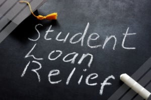 student loan relief written on chalkboard